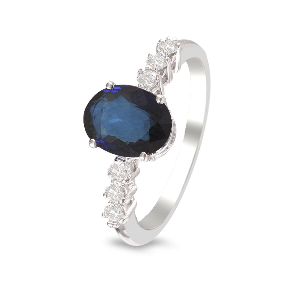 Anillo con zafiro y diamantes laterales