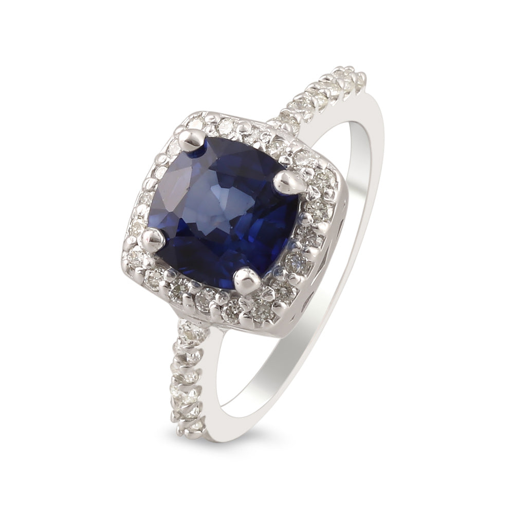 Anillo de oro blanco con zafiro y diamantes