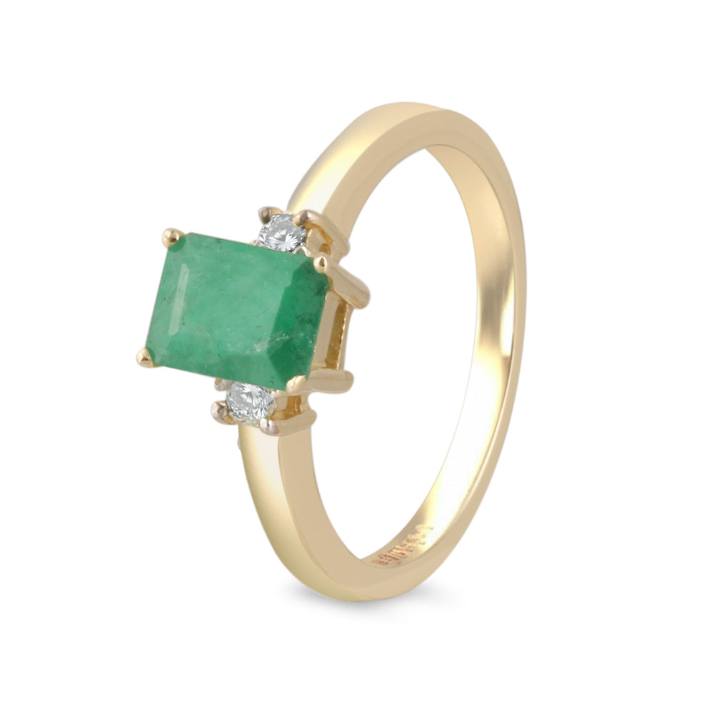 Anillo con esmeralda y diamantes laterales