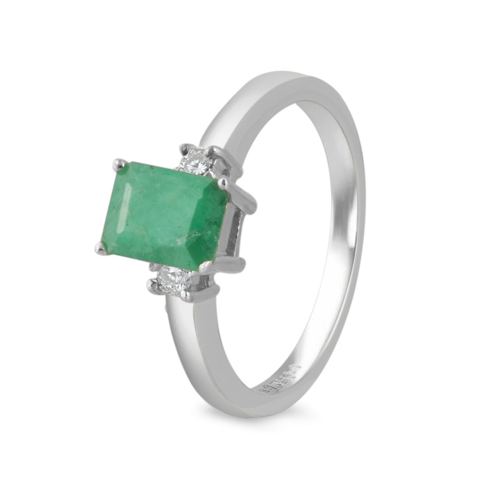 Anillo con esmeralda y diamantes laterales