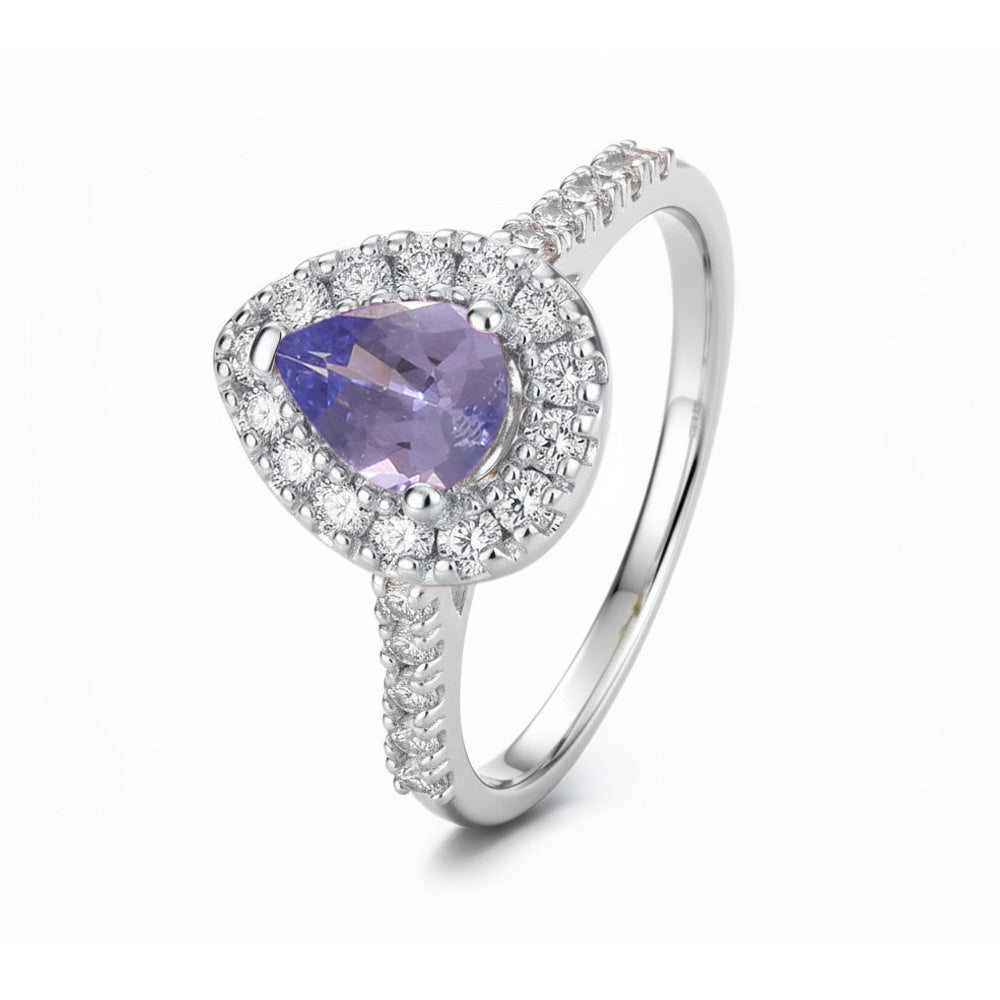 Anillo con tanzanita y halo de diamantes