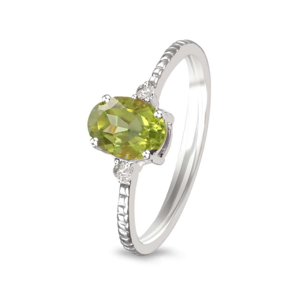 Anillo con peridoto y diamantes laterales (Agosto)