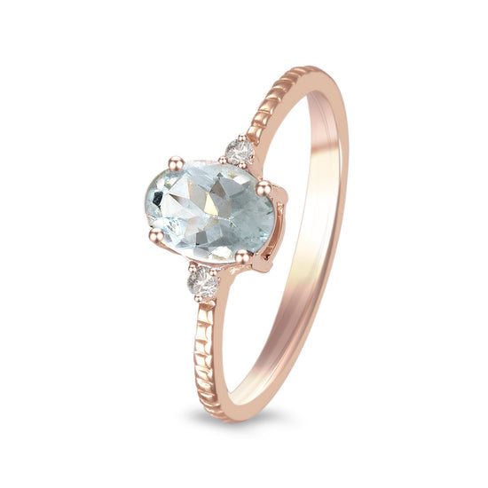 Anillo con aguamarina y diamantes laterales (Marzo)