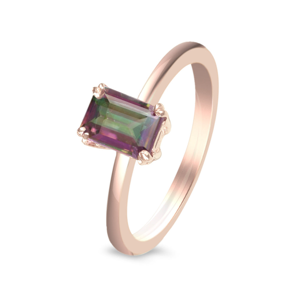 Anillo de oro rosa con topacio