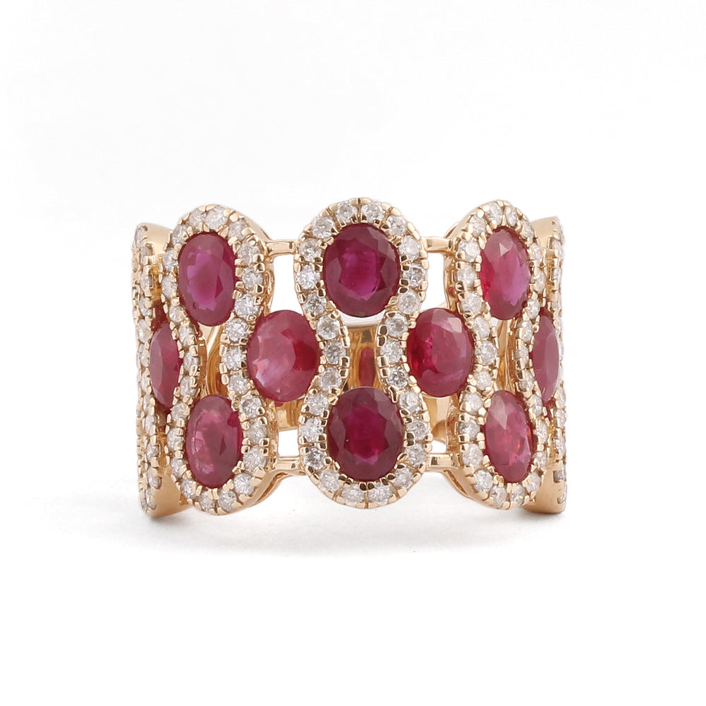 Anillo tres hileras con rubíes y diamantes en oro amarillo