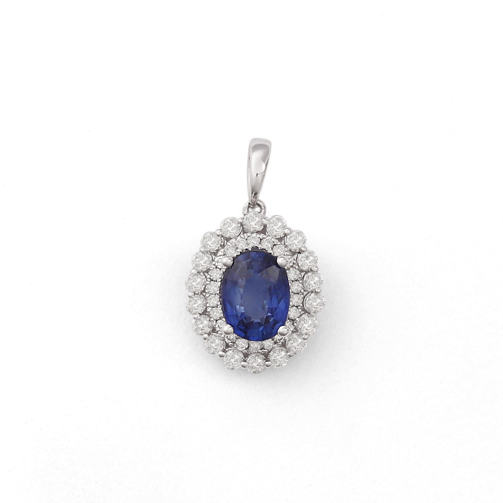Dije con zafiro oval y diamantes laterales en oro blanco