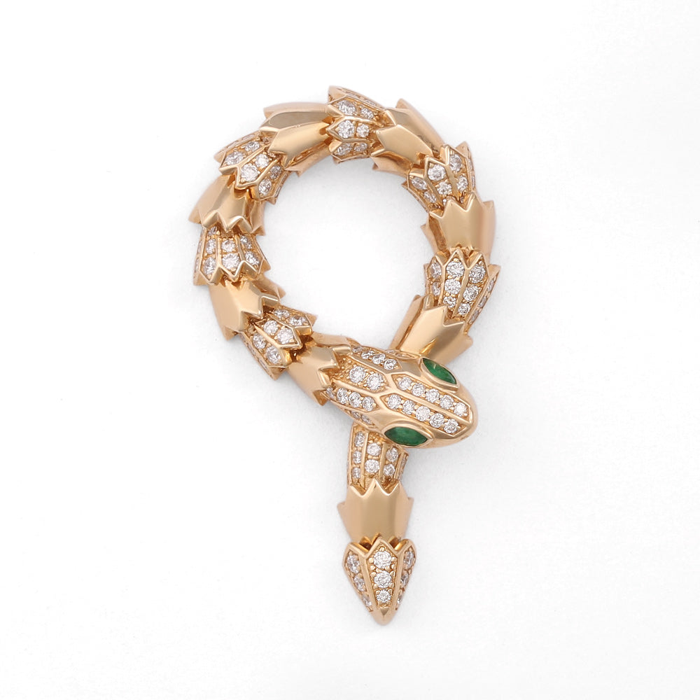 Dije de serpiente con diamantes y esmeralda en oro rosa