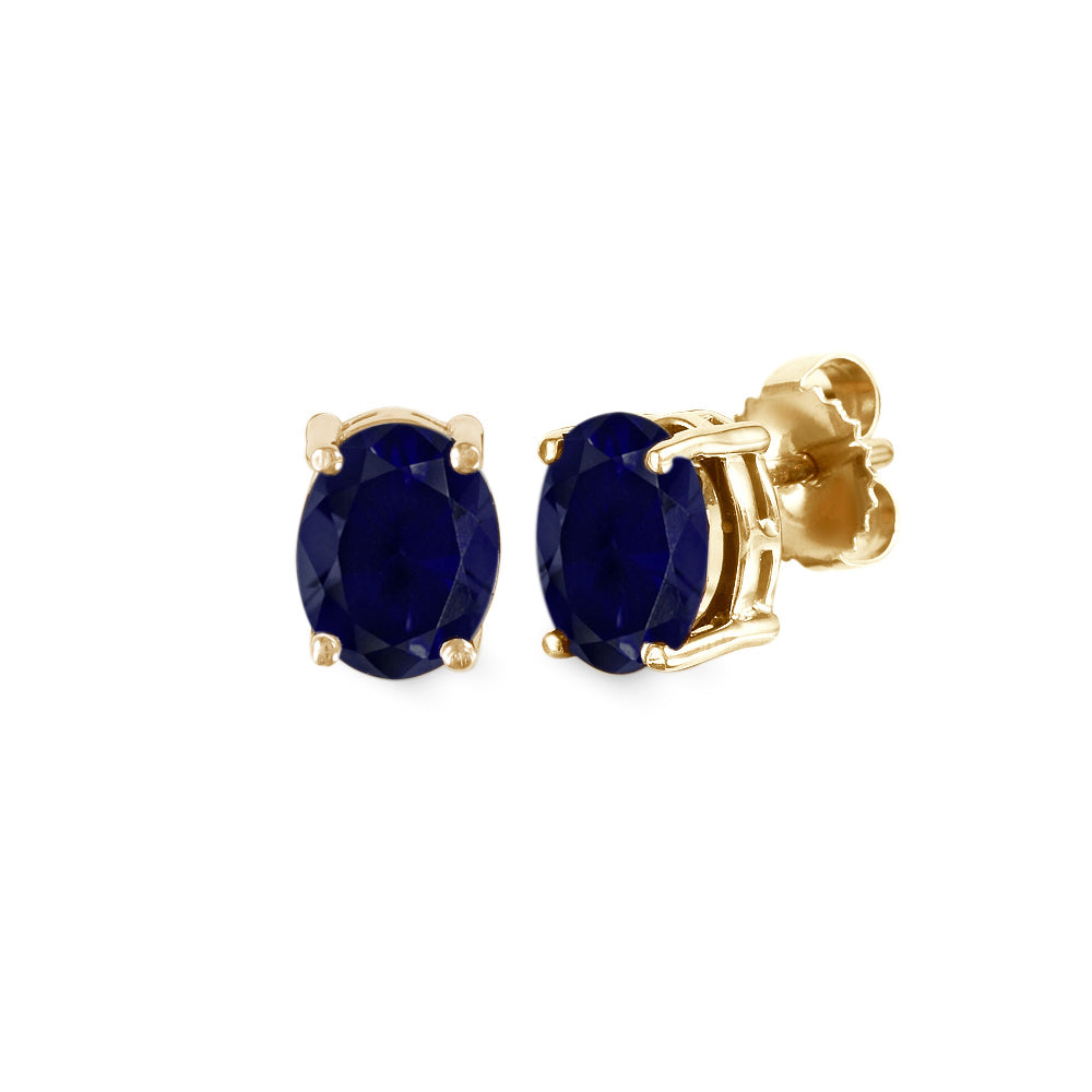 Aretes estilo corto con zafiro oval en oro amarillo