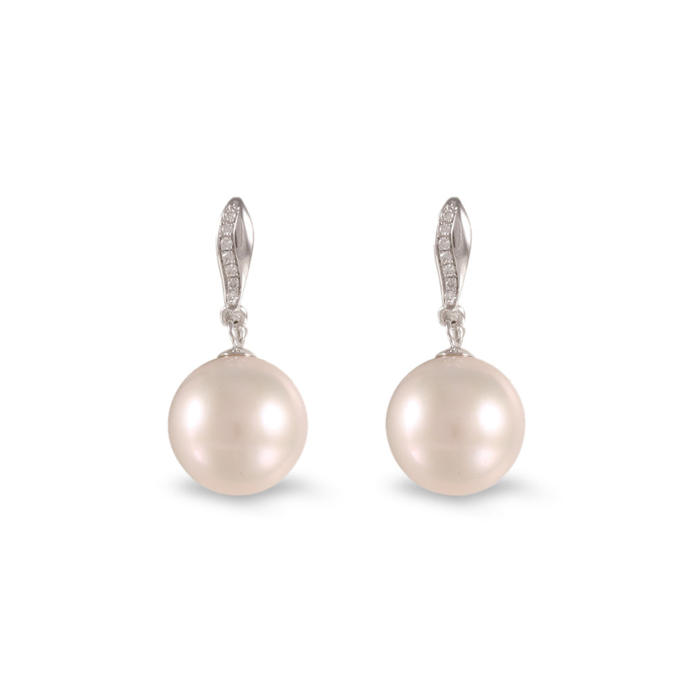 Aretes con perla y diamantes