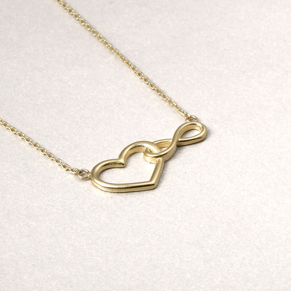 Gargantilla con dije de corazón e infinito