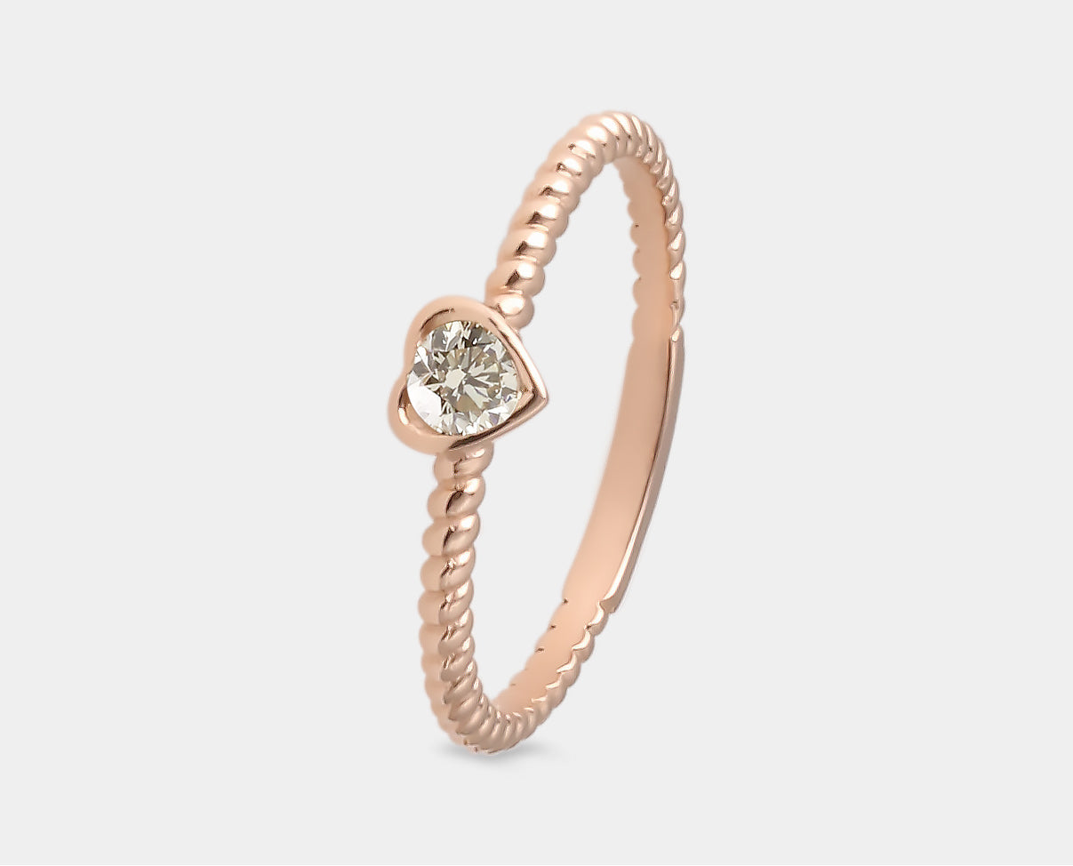 Anillo Colección Latidos diseño corazón en oro rosa con diamante