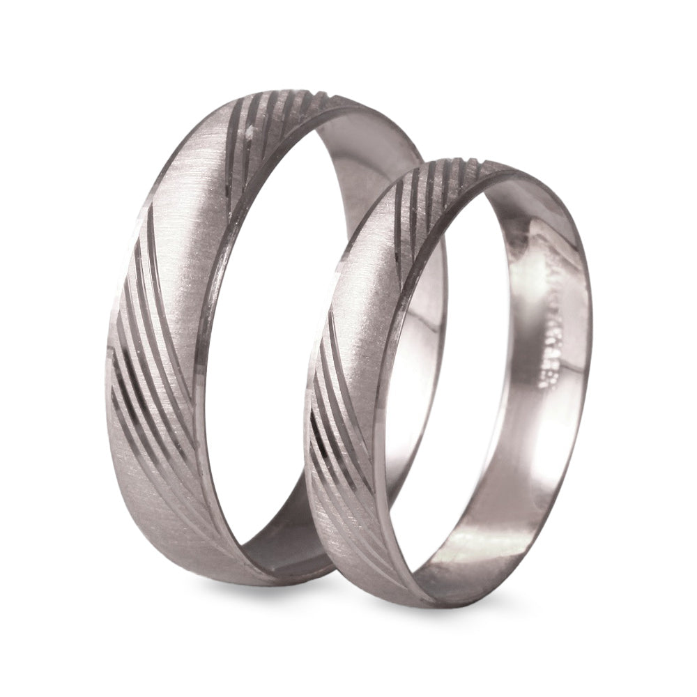 Par de argollas de matrimonio ligeras diseño líneas diagonales