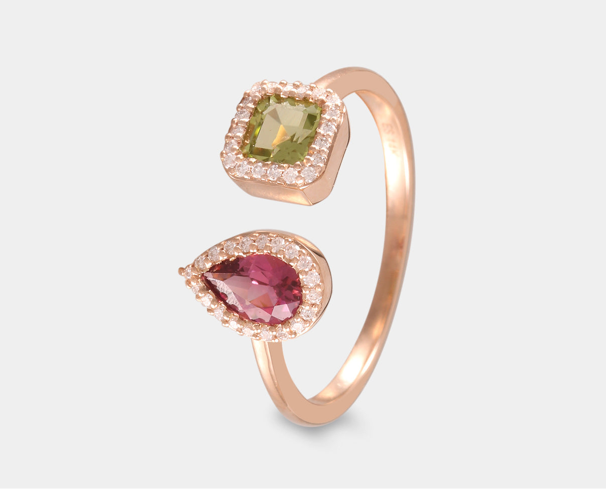 Anillo en oro rosa de 14 k con turmalina , peridoto y diamantes laterales.