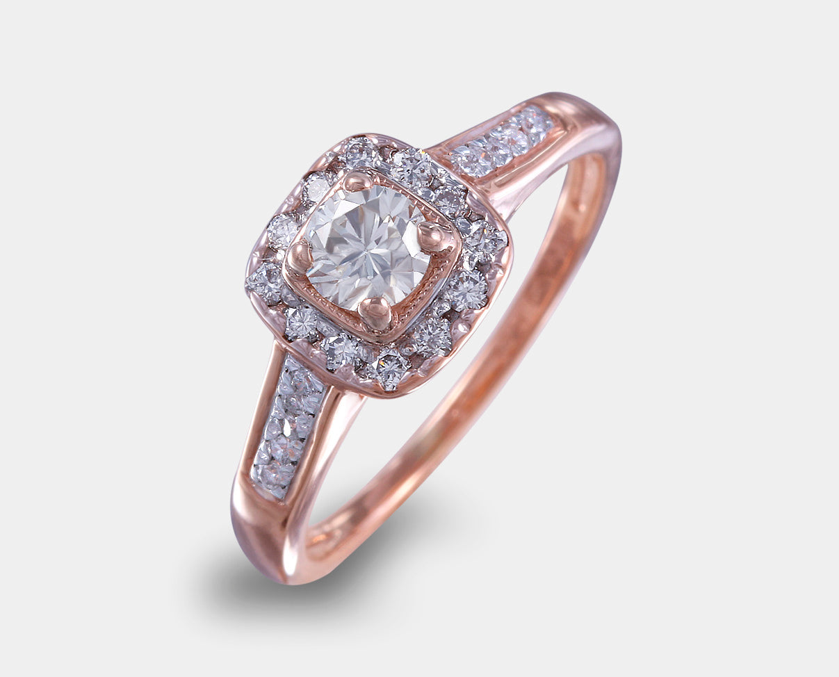 anillo de compromiso oro rosa con diamantes laterales