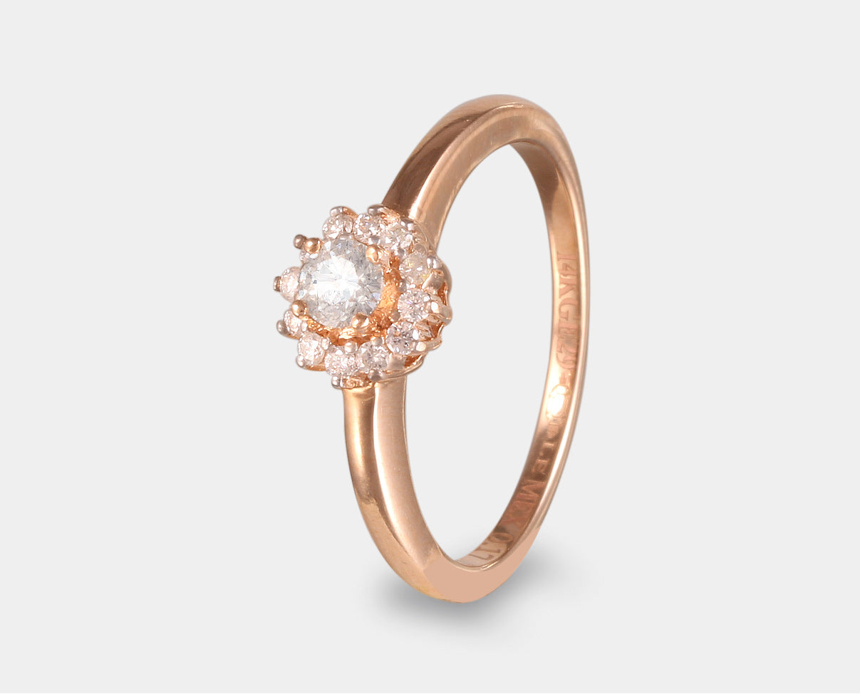 Anillo de Compromiso con halo de diamantes en oro rosa de 14 k. 