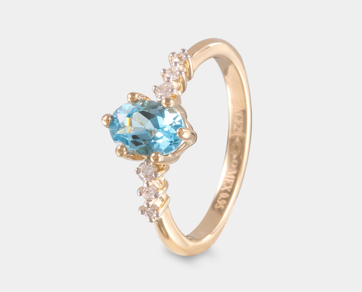 Anillo Oro Amarillo con Topacio Azul y Diamantes , gemas