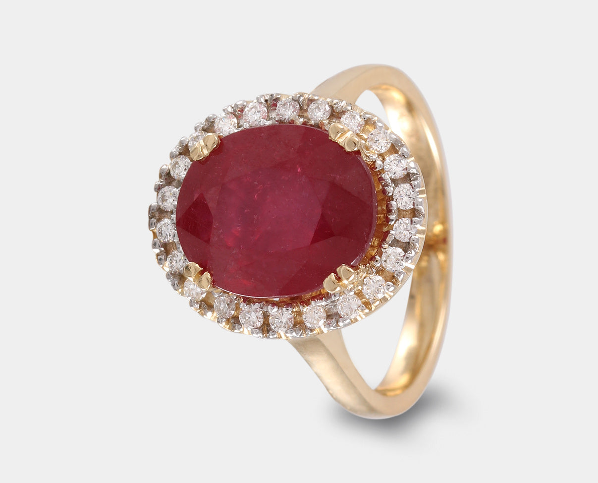anillo oro amarillo con rubi y halo de  diamantes