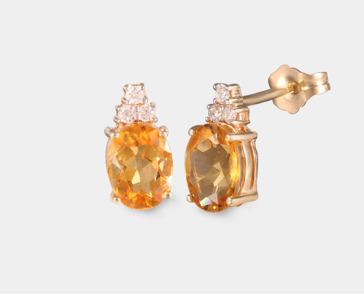 Aretes con Citrina corte oval y diamantes en Oro Amarillo de 14k. Joyas con piedras semipreciosas.
