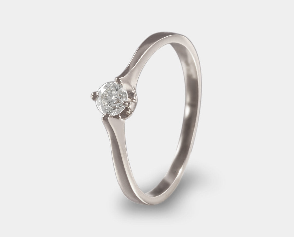 anillo de compromiso con diamante oro rosa. anillo solitario con diamante.